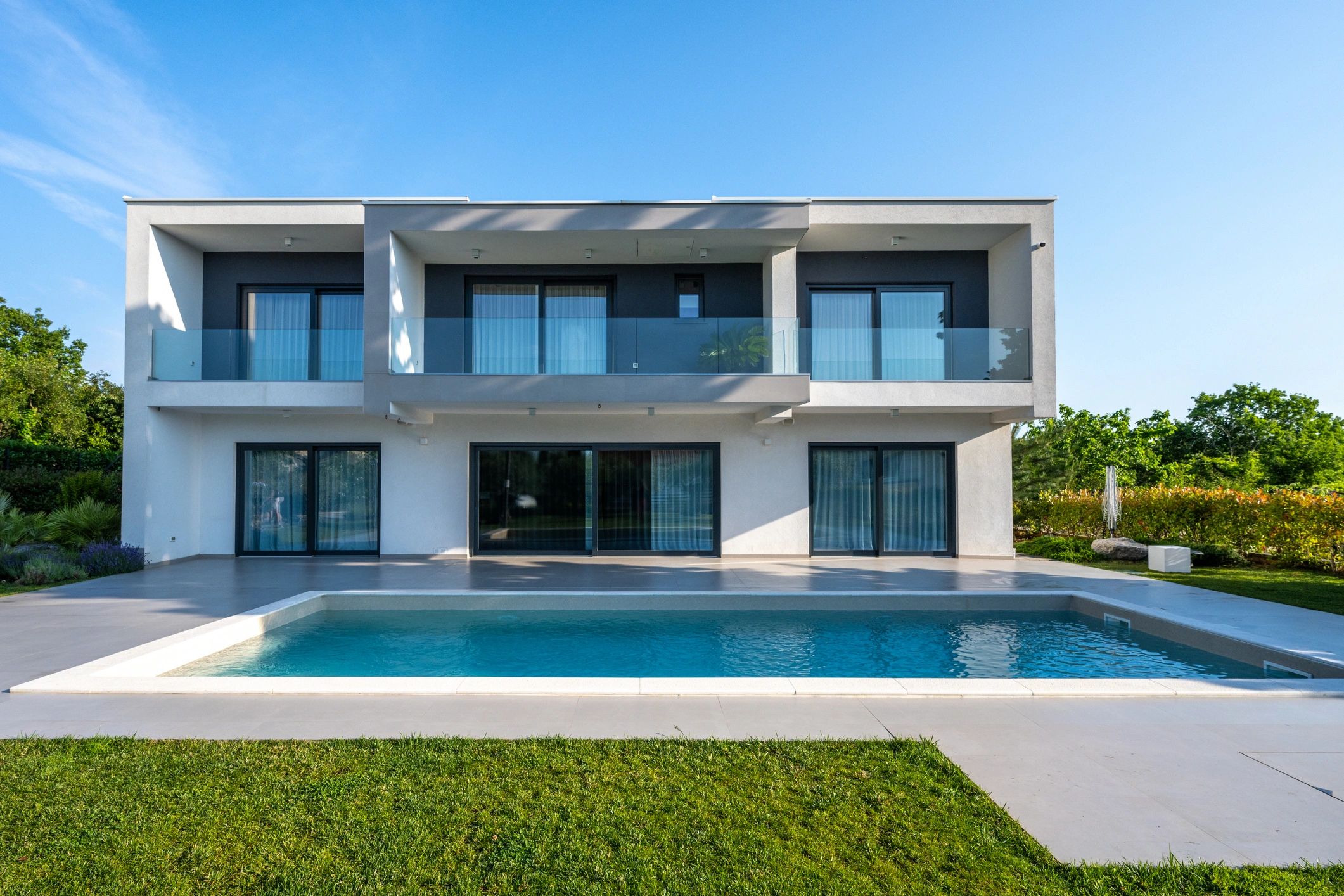 Luxury modern home exterior at twilight