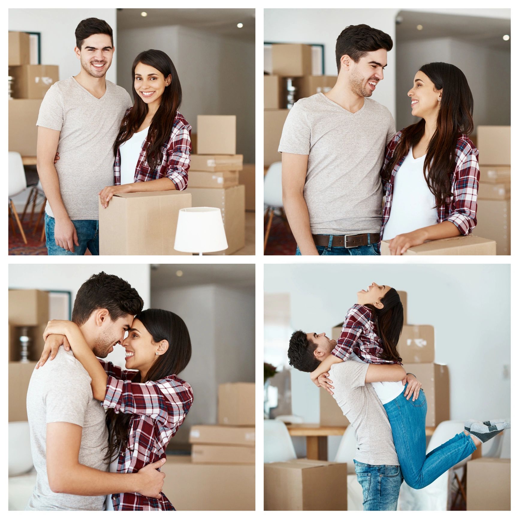 Couple carrying moving boxes into their new home